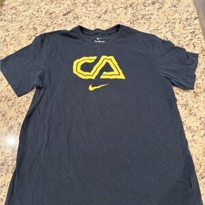 Nike Men's Navy Tee with Yellow Graphic